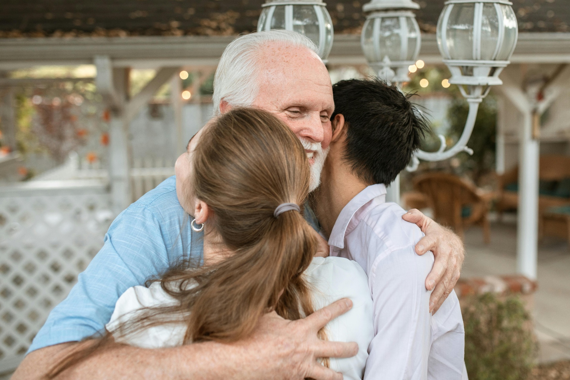 A family sharing a warm, reassuring embrace